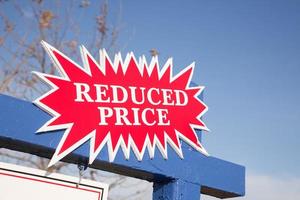 Red Reduced Price Burst Sign photo