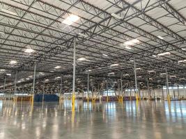 Massive Empty Industrial Warehouse Interior photo