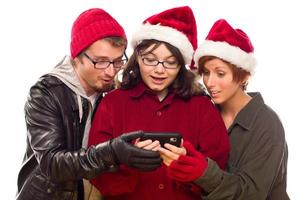 Three Friends Enjoying A Cell Phone Together photo