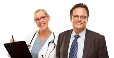 Smiling Businessman with Female Doctor or Nurse photo