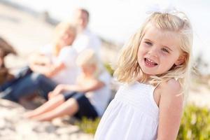 Adorable Little Blonde Girl Having Fun At the Beach photo