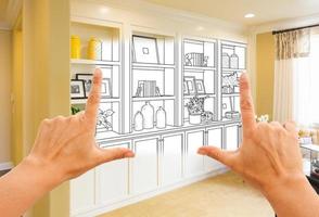 Hands Framing Custom Built-in Shelves and Cabinets Design Drawing with Section of Finished Photo. photo