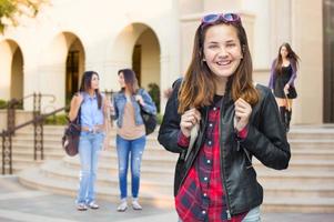 Mixed Race Young Female Student Walking On Campus photo