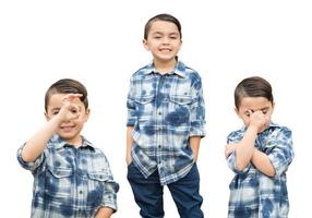 Linda variedad de retrato de niño de raza mixta en blanco foto