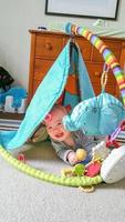 Adorable Chinese and Caucasian Baby Boy Playing On The Floor photo