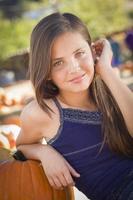 Preteen Girl Portrait at the Pumpkin Patch photo