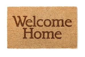 alfombra de bienvenida a casa en blanco foto