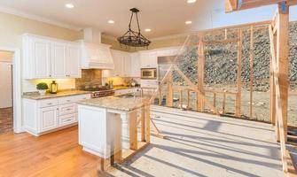 Transition of Beautiful New Home Kitchen From Framing To Completion. photo