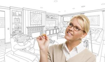 Woman With Pencil Over Living Room Design Drawing photo