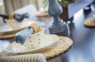 Abstract of Dining Table with Place Settings photo