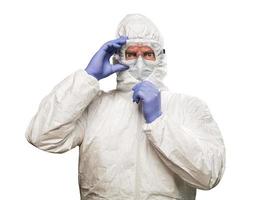 Man With Intense Expression Wearing HAZMAT Protective Clothing Isolated On A White Background. photo