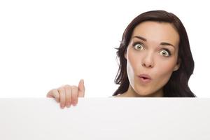 Wide Eyed Mixed Race Female Holding Blank Sign on White photo