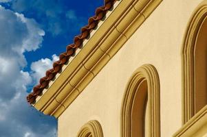 Stucco Wall Construction and Arched Windows photo