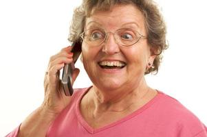 Senior Woman Using Cell Phone photo