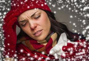 Sick Woman with Tissue and Snow Effect Surrounding photo