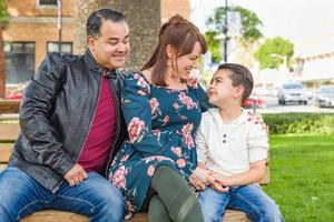 Mixed Race Young Family Portrait At The Park photo