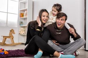Happy family in the room photo