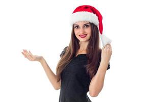 young girl in santa hat photo