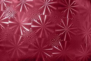 Abstract pattern with round segments with rays on holographic paper in color 2023 Viva Magenta. photo