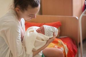 Mom and Her Little Newborn Girl photo