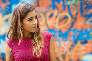 Teenagers girl, beautiful in a portrait in front of a colorful mural photo