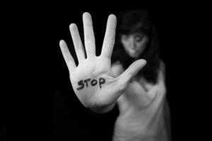Stop violence against women. Hand saying stop photo