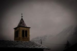 the beautiful mountains of the Aosta valley immersed in the December snow, during the Christmas holidays photo