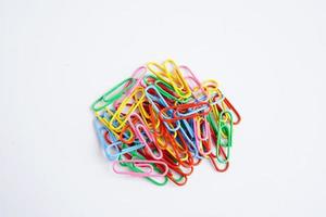 Paper clips colorful isolated on white background, office equipment. photo