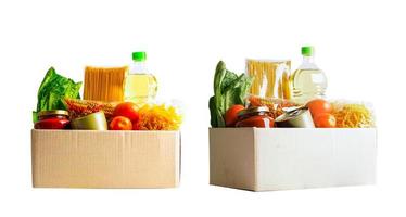 Foodstuffs in donation box isolated on white background for volunteer to help people. photo