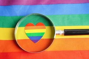 Asian woman with rainbow flag, LGBT symbol rights and gender equality, LGBT Pride Month in June. photo