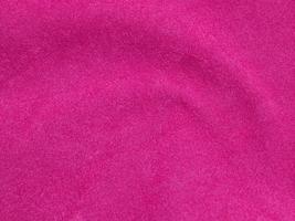 Pink velvet fabric texture used as background. Empty pink  fabric background of soft and smooth textile material. There is space for text photo