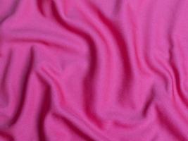 Pink velvet fabric texture used as background. Empty pink  fabric background of soft and smooth textile material. There is space for text photo