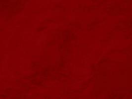 red clean wool texture background. light natural sheep wool.red seamless cotton. texture of fluffy fur for designers. close-up fragment white wool carpet.. photo