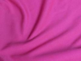 Pink velvet fabric texture used as background. Empty pink  fabric background of soft and smooth textile material. There is space for text photo