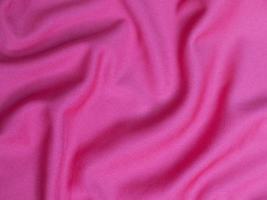 Pink velvet fabric texture used as background. Empty pink  fabric background of soft and smooth textile material. There is space for text photo