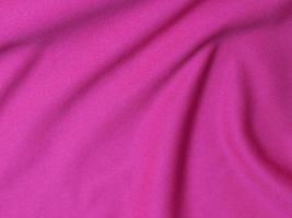 Pink velvet fabric texture used as background. Empty pink  fabric background of soft and smooth textile material. There is space for text photo