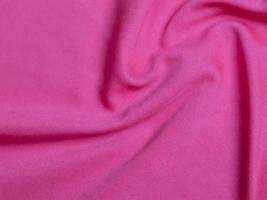 Pink velvet fabric texture used as background. Empty pink  fabric background of soft and smooth textile material. There is space for text photo