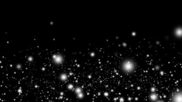 weiße Partikel auf schwarzem Hintergrund. glitzerpartikel, abstrakte saubere partikelanimation video