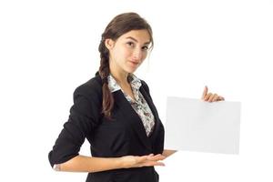 woman in uniform with white placard in hands photo