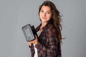 brunette girl testing virtual reality glasses photo