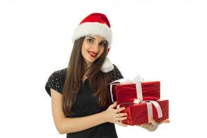 Beauty Woman in santa hat with red gift photo