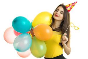 Cheerful girl on birthday party photo