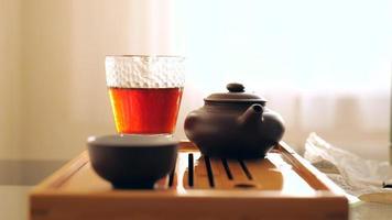 Pu-erh tea in a glass bowl. video