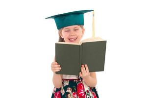 chica con sombrero con un libro foto