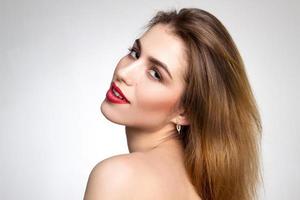 Girl with red lips looking at the camera photo