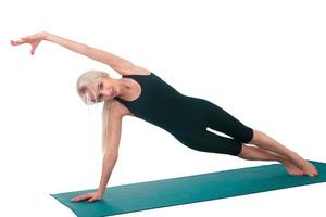 Woman practicing yoga photo