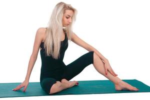 Woman practicing yoga photo