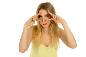 girl in yellow t-shirt posing in studio photo