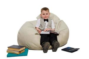 cheerful elegant schoolboy in studio photo