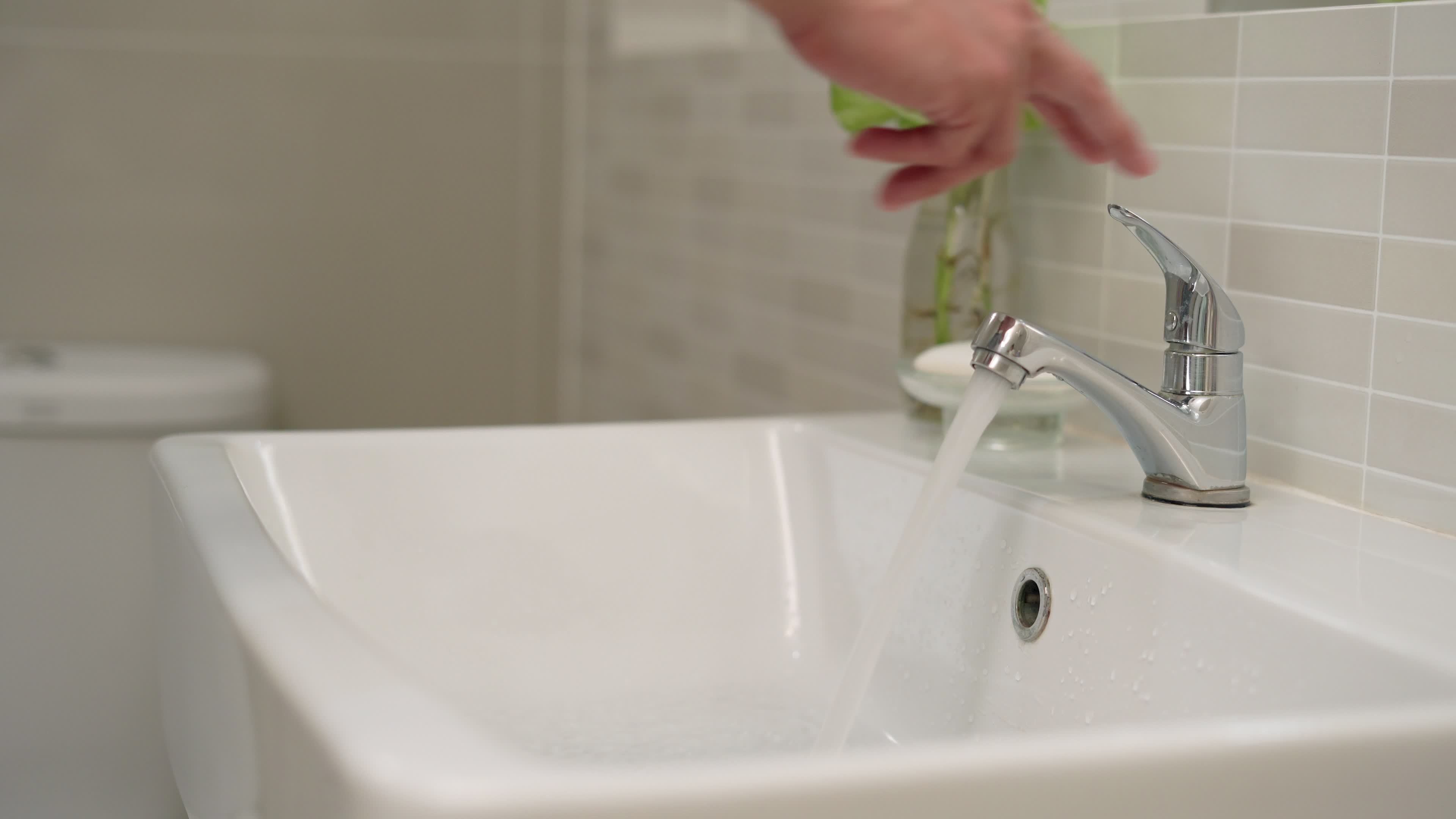 Concept save water. people turn off water so man turn off. Turn off the water after not